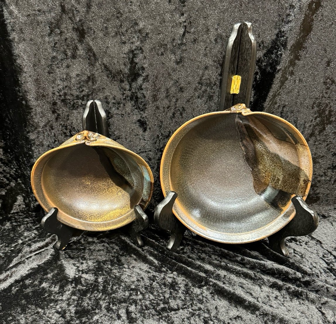 Two Vintage hand thrown then pinched nesting bowls
