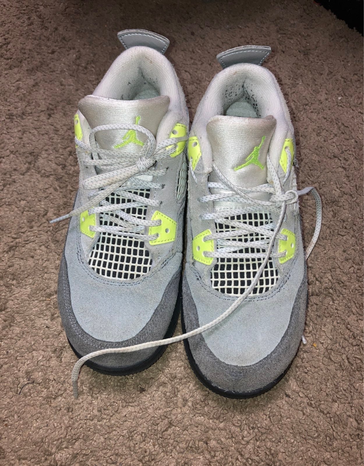 Neon green Jordan 4s