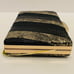 Gianni Bini Pierced Snake Black/Gold Mini Clutch Purse w/Chain Strap NWT.