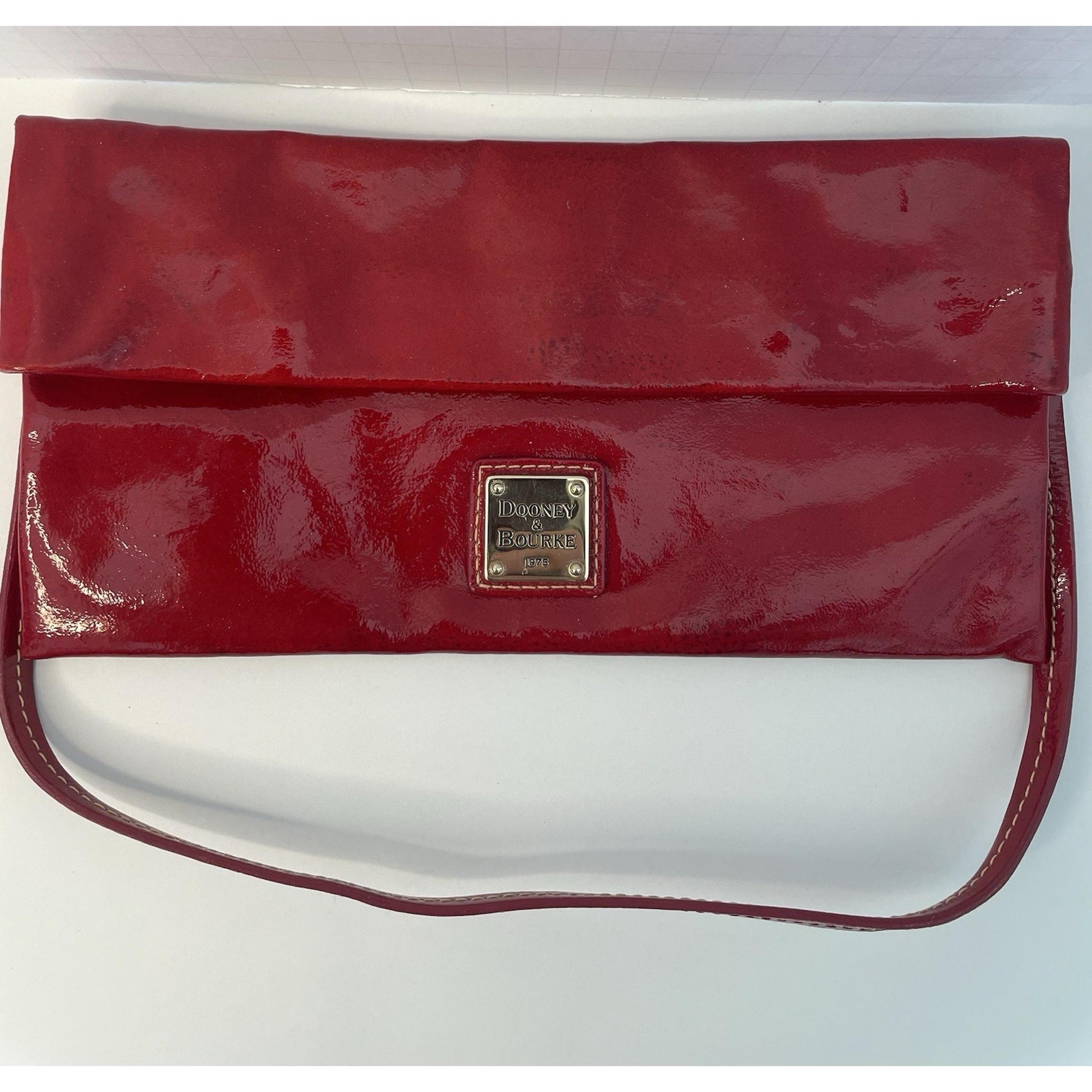 Dooney and Bourke Cherry Red Patent Leather Fold Over Snap Clutch Hand Bag Purse