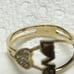 14 k solid yellow gold ring with white CZ