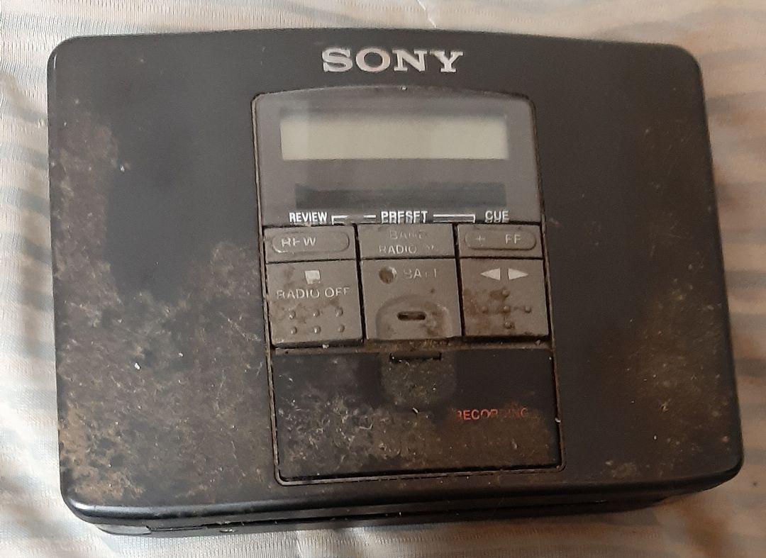 This is a set of two: a Sony Walkman and an Aiwa cassette player.