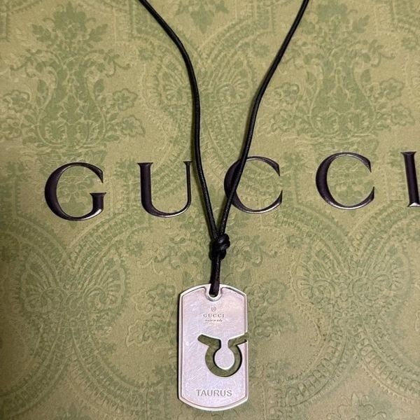 Vintage Gucci Sterling Silver Zodiac Taurus Pendant on Black Leather Cord.