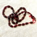 Strand of 7x3mm bicone Garnet beads 14in. 72 84