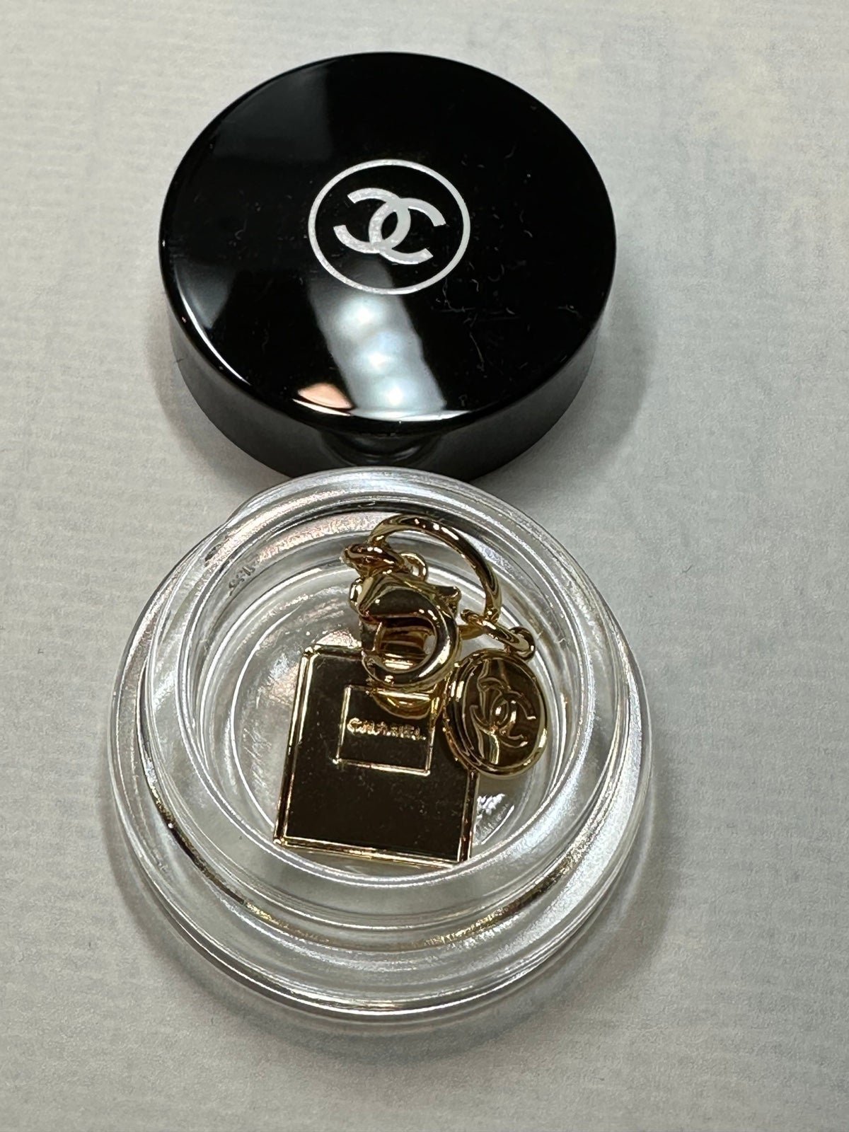 Chanel holiday charm with a jar