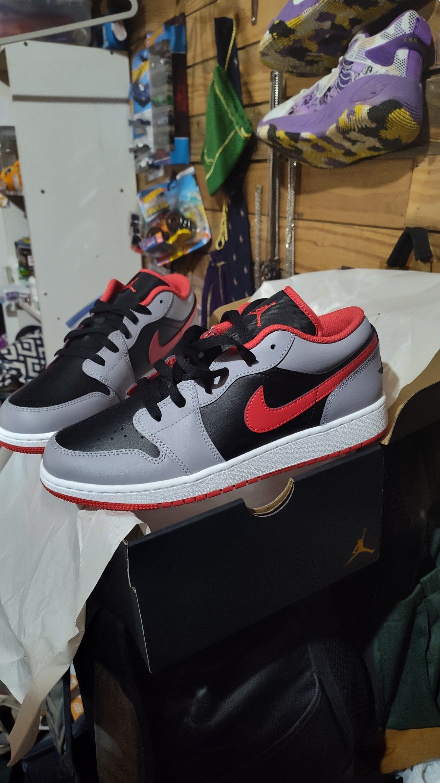 A brand new pair of 8.5 mens cement dunks