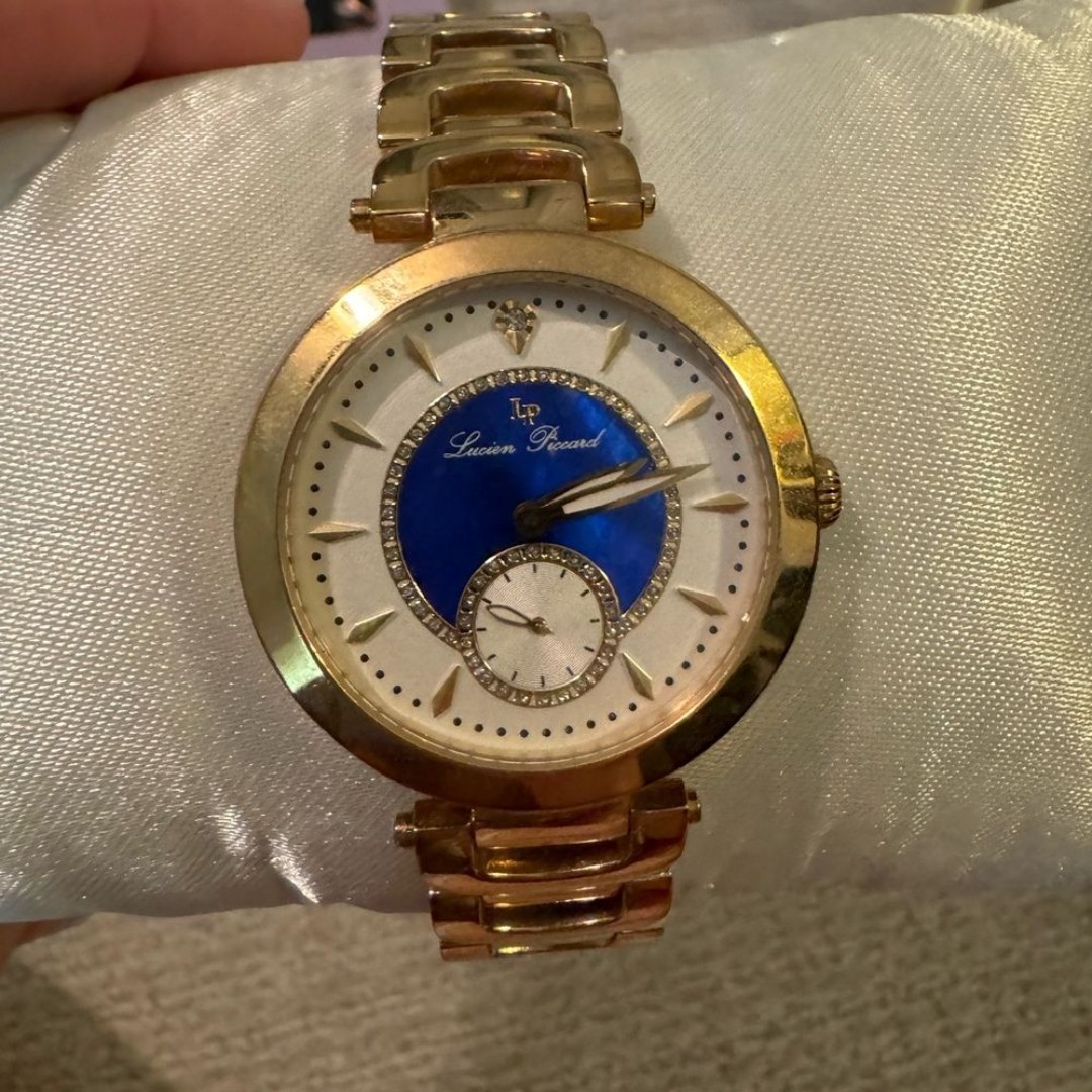 Lucien Piccard watch with white and blue face