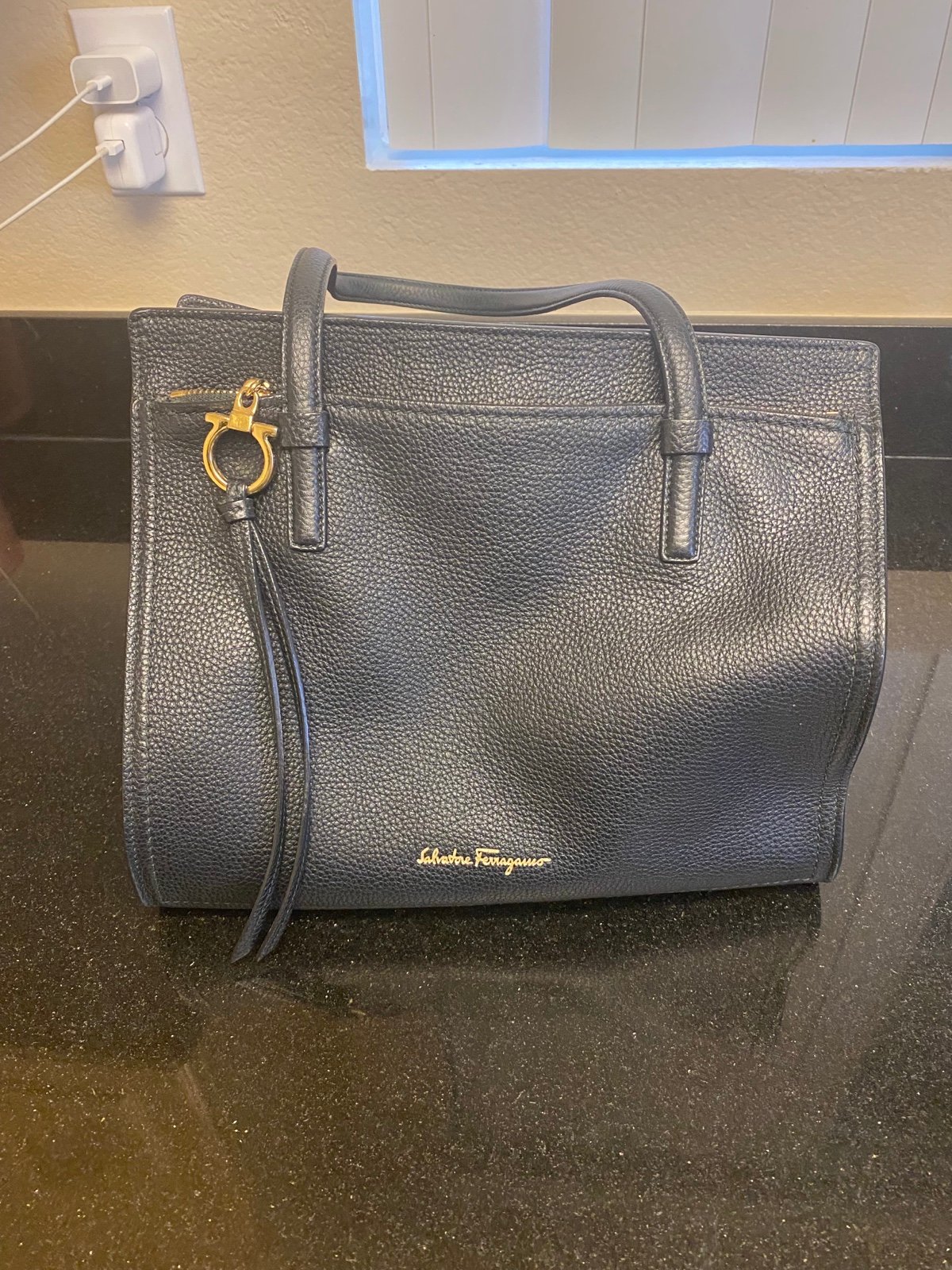 Salvatore Ferragamo black leather handbag