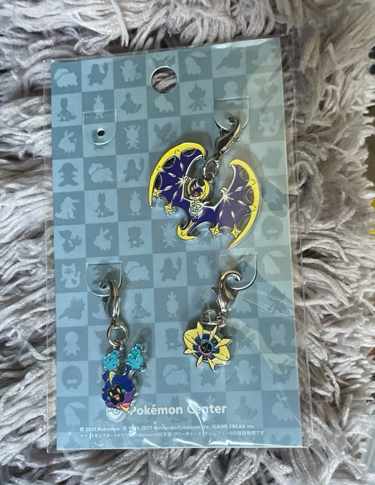 Official pokemon cosmog cosmoem lunala charms pokemon moon