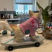 French bulldog skateboarding statue