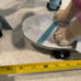 French bulldog skateboarding statue