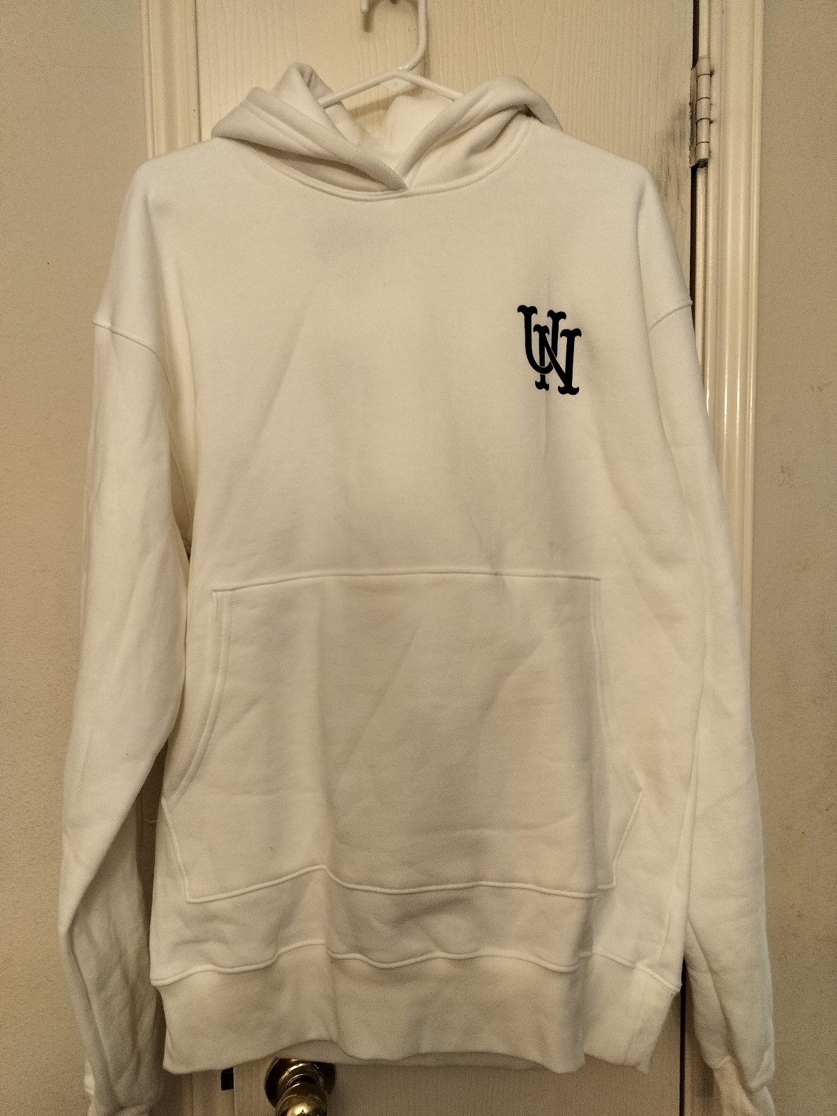 Urban necessities White HOODIE . Small but runs medium.
