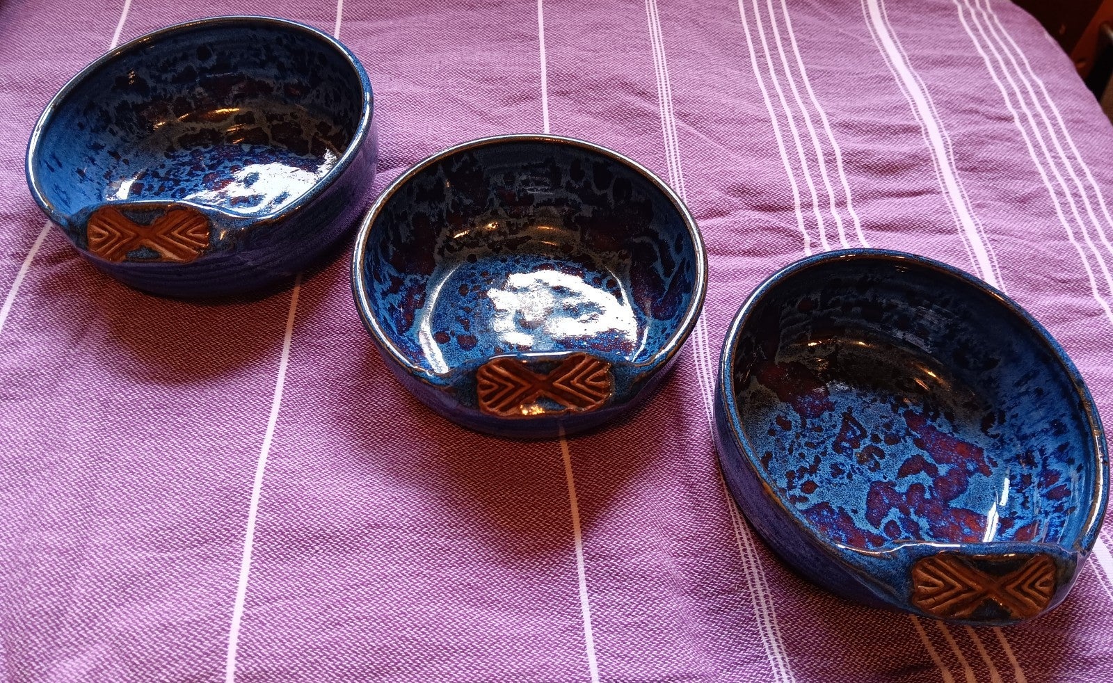 Lot 1- These 3 5 1/2 Bev Birkle handmade double shaded blue pottery bowls