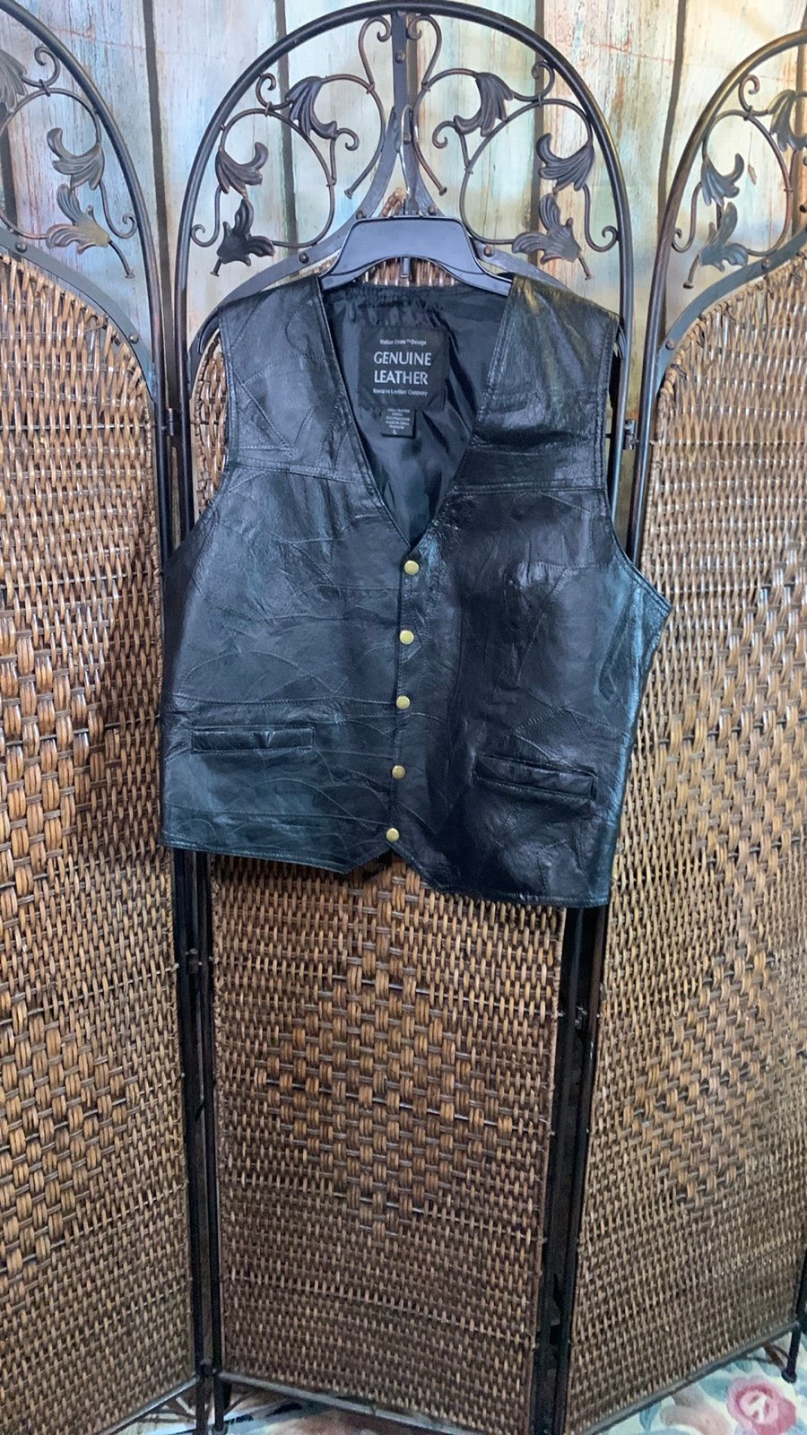 Vintage Classic black leather vest. Features button closure. Perfect for layerin