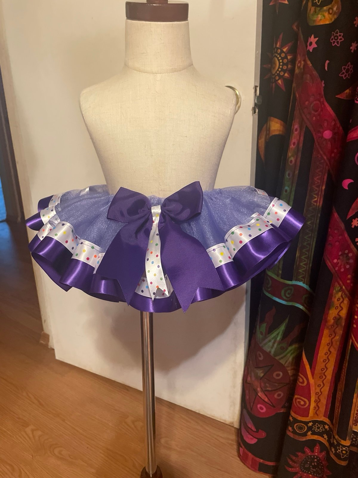 Purple tutu with polka dot ribbon