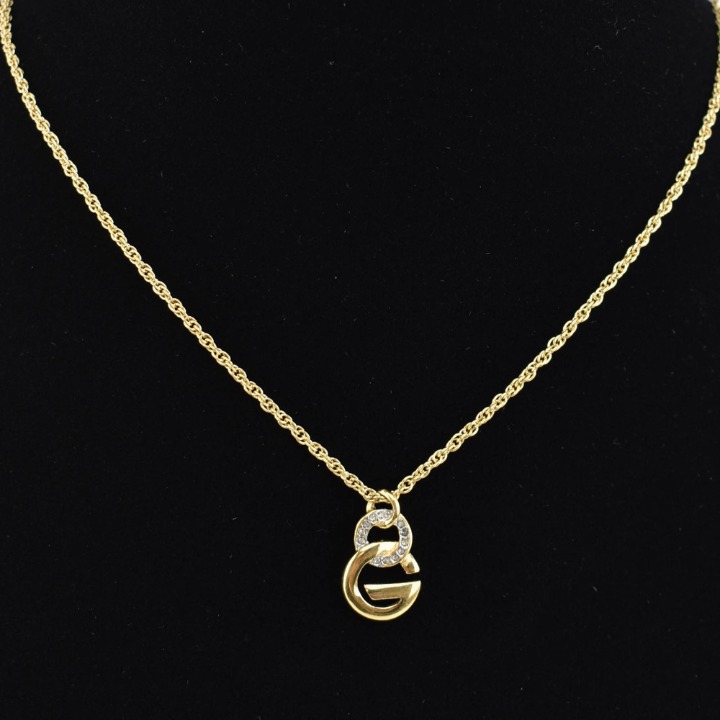 GIVENCHY: Gold, Metal G Pendant & Crystals Necklace (ou)