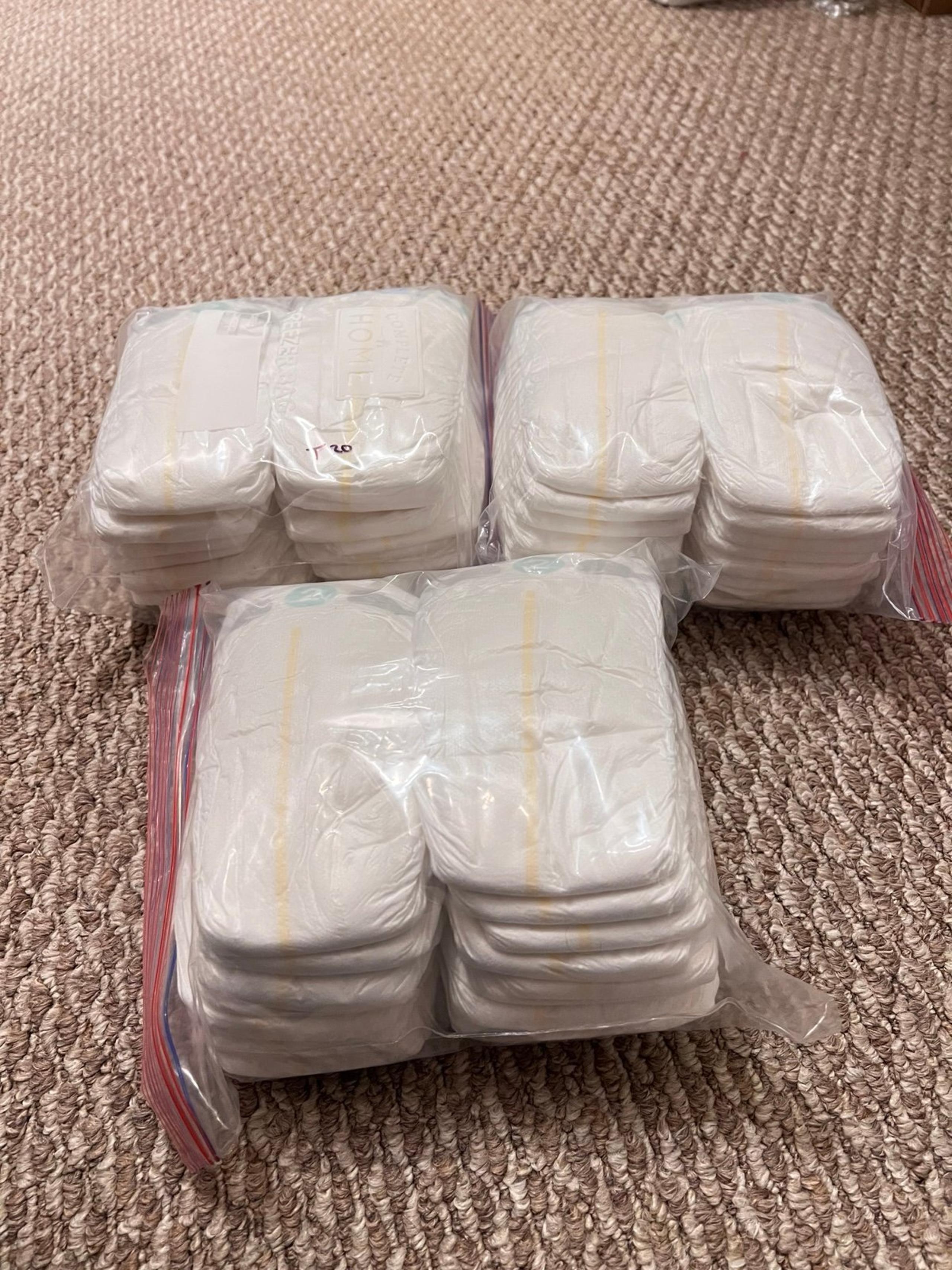 Bundle of 60 Up & Up brand disposable diapers