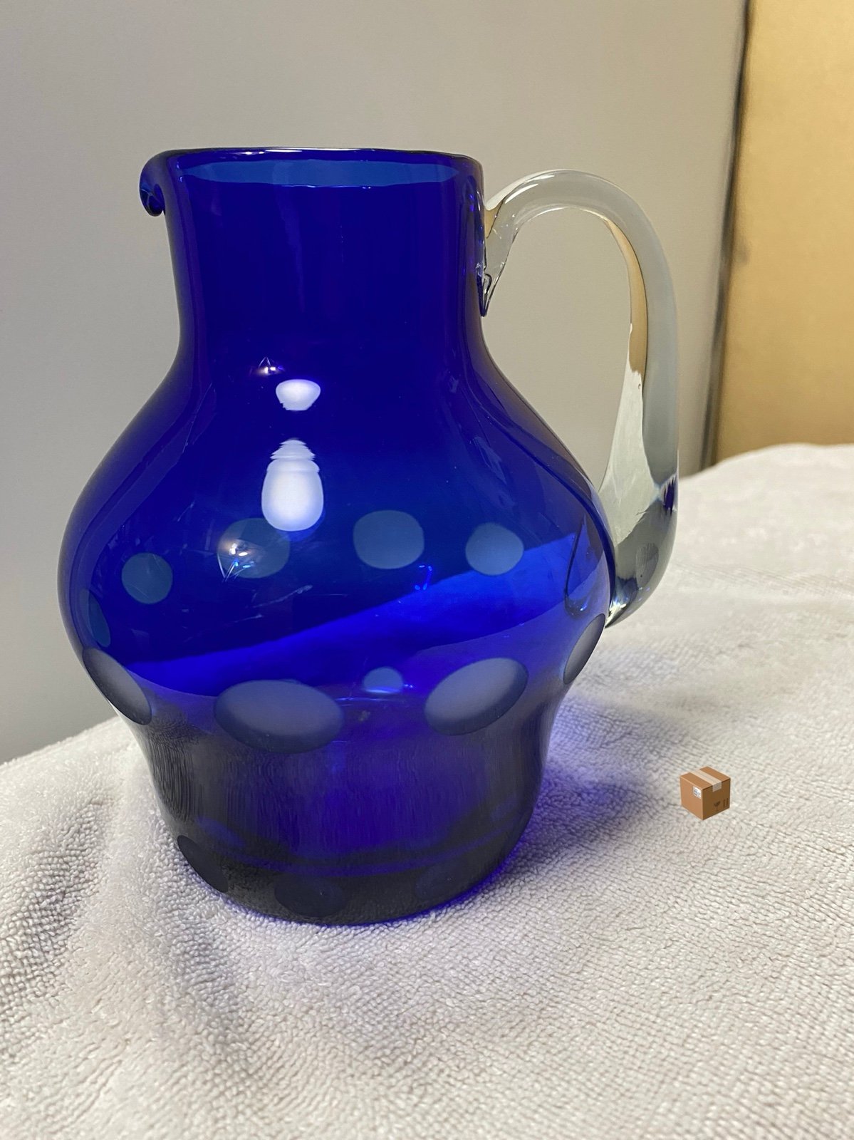 Gorgeous hand blown glass pitcher with cut glass frosted circles. Cobalt blue.