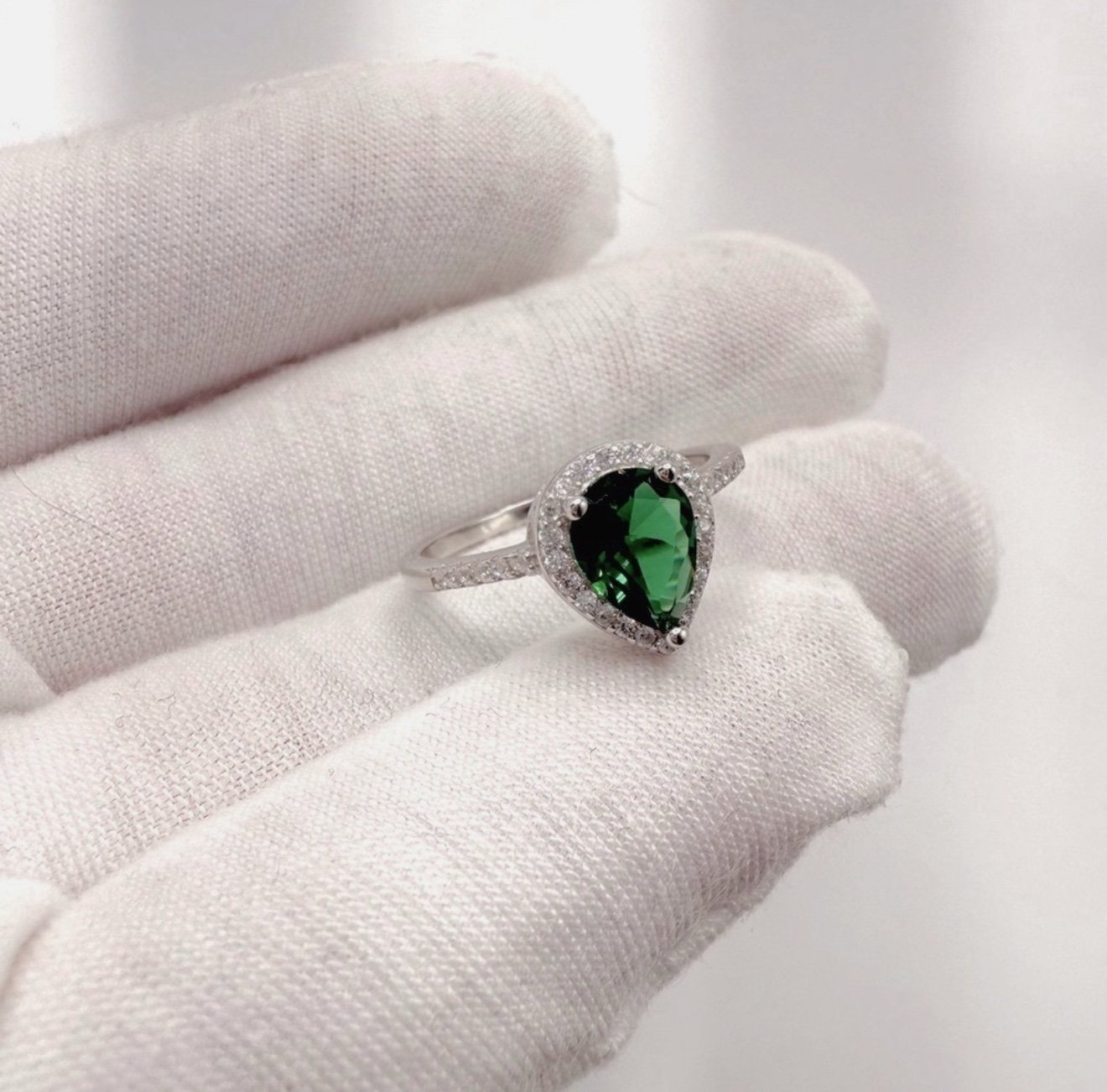 .925 Sterling Silver Simulated Emerald Cz and Clear Cz Pear Shape Ring