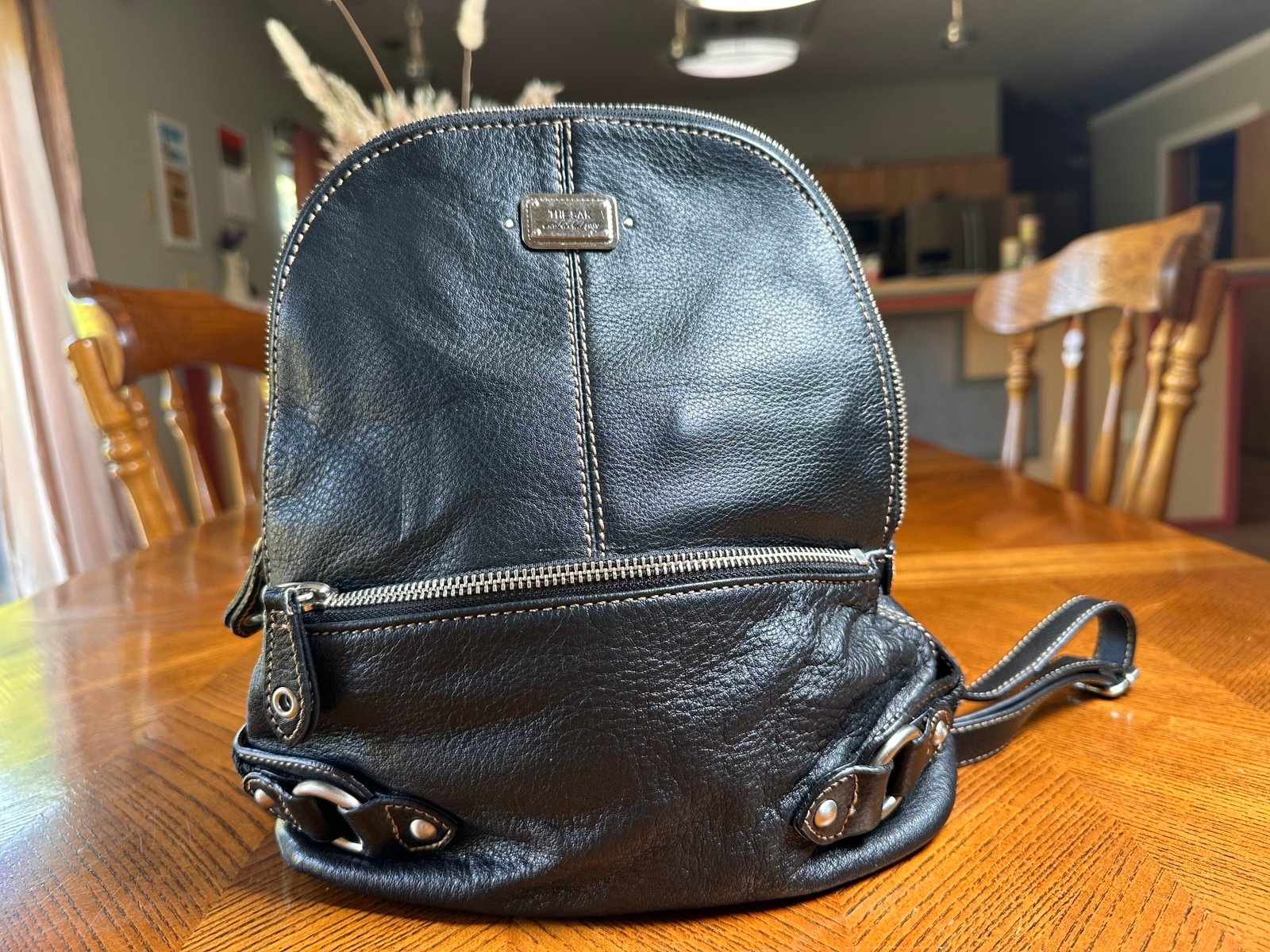 The SAK Small Black Leather Backpack w/ Silver Accents