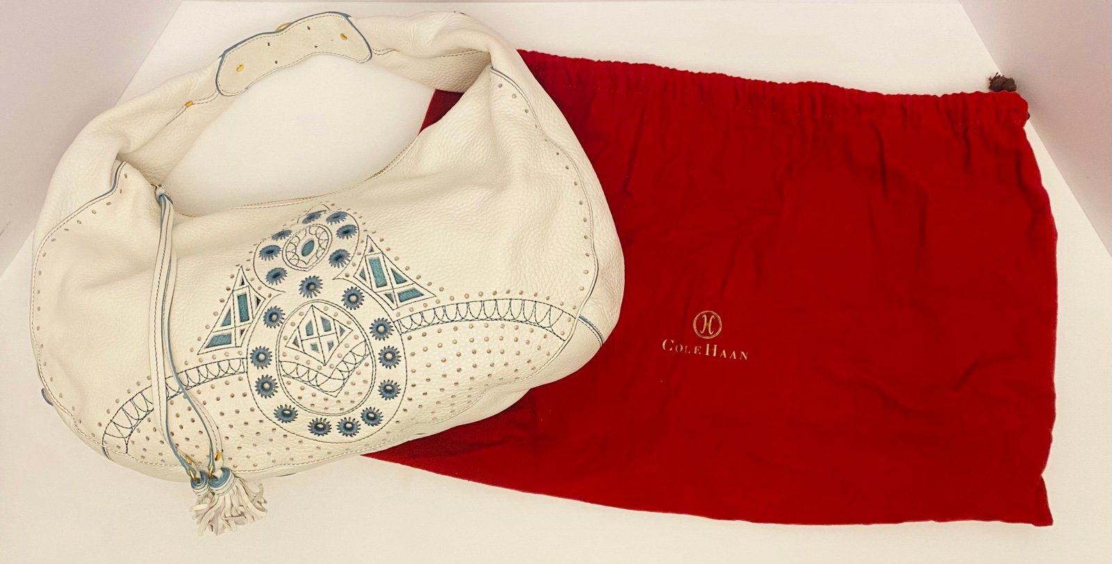 Cole Haan Pebbled Leather White Shoulder Bag with Teal Accents Boho Tassel.