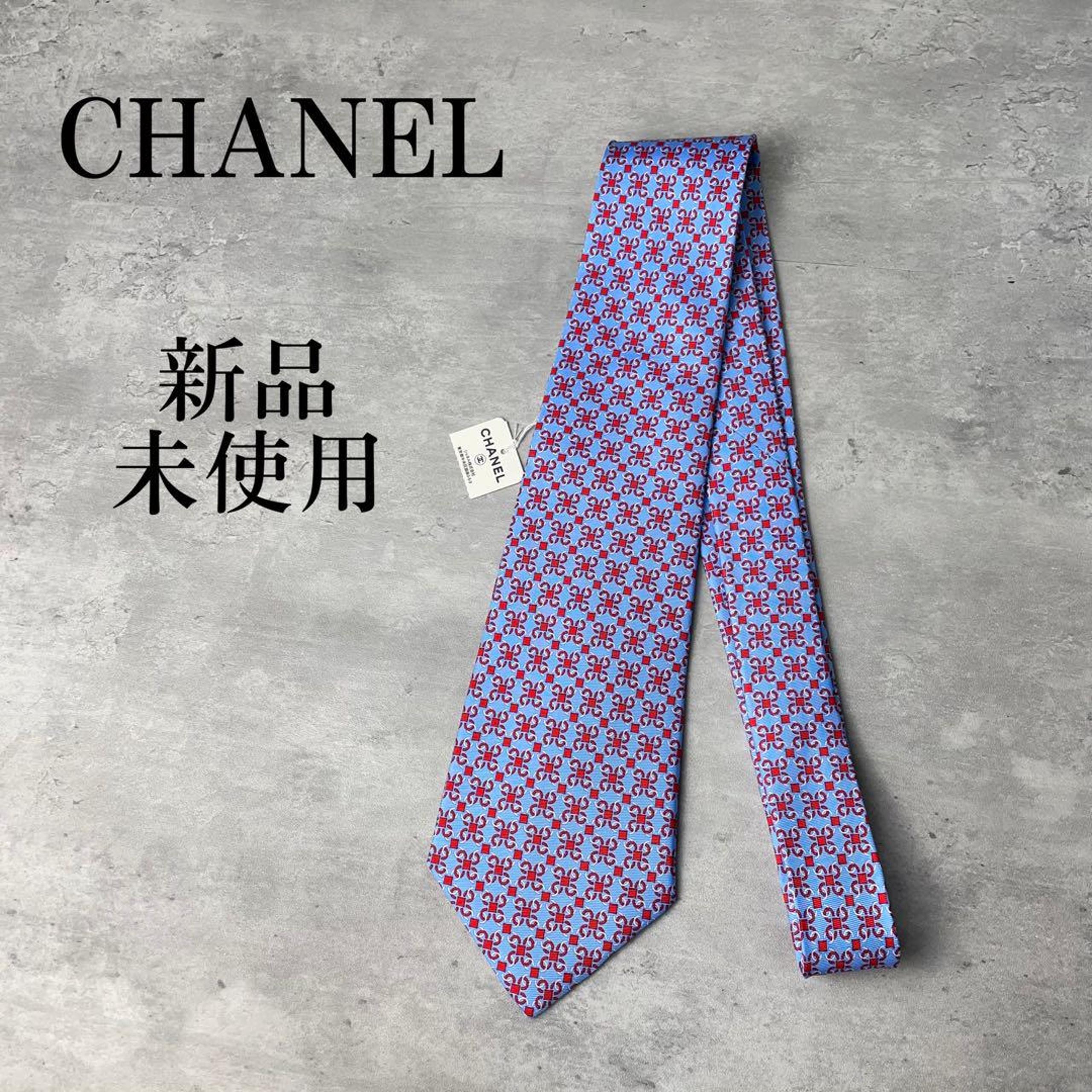 Excellent condition CHANEL Chanel Coco Mark All-over Logo Tie Light Blue Red