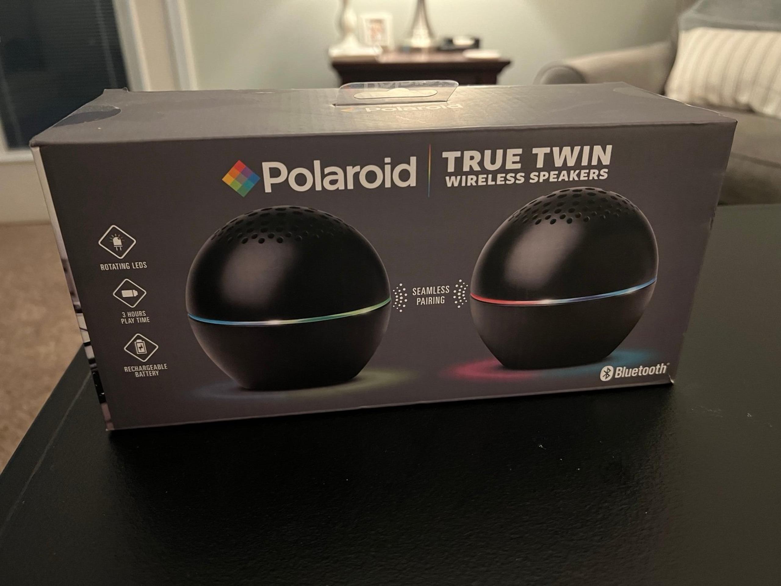 Two Polaroid wireless speakers