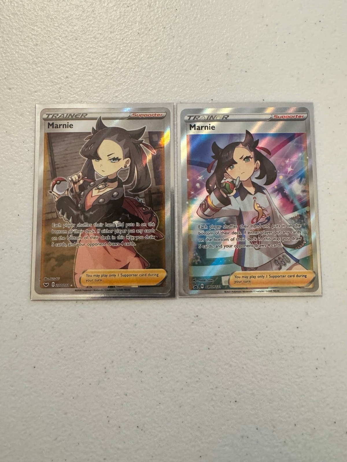 Marnie full art trainers 200/202 and Marnie Promo full art SWSH 121 Pokémon TCG