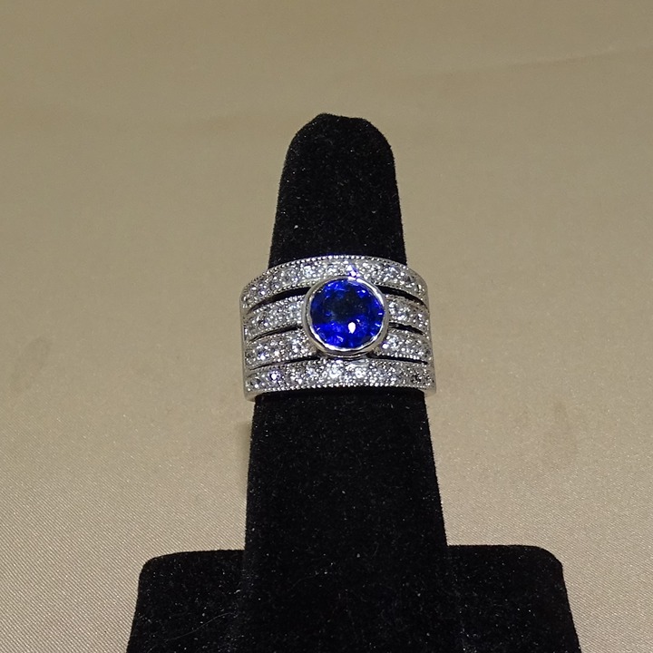 TRILLION CUT BLUE SAPPHIRE ON CITRINE SURROUNDING RING