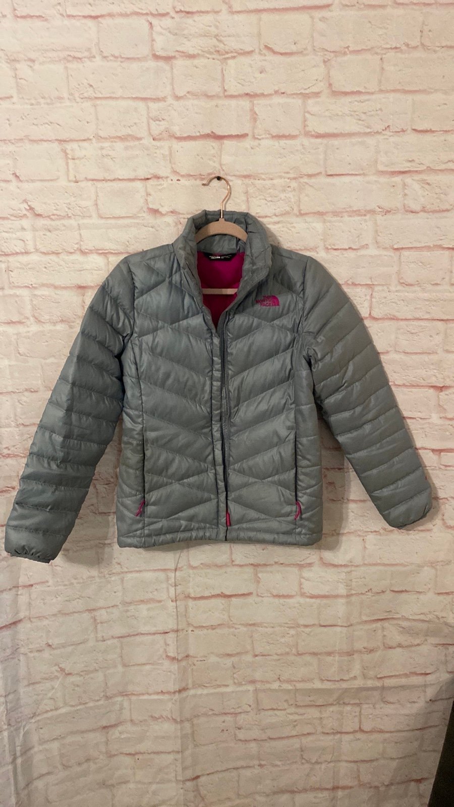 The North Face women’s silver/pink 550 down puffer jacket