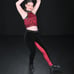 Red and black custom dance costume with rhinestones and fringe.