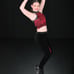 Red and black custom dance costume with rhinestones and fringe.