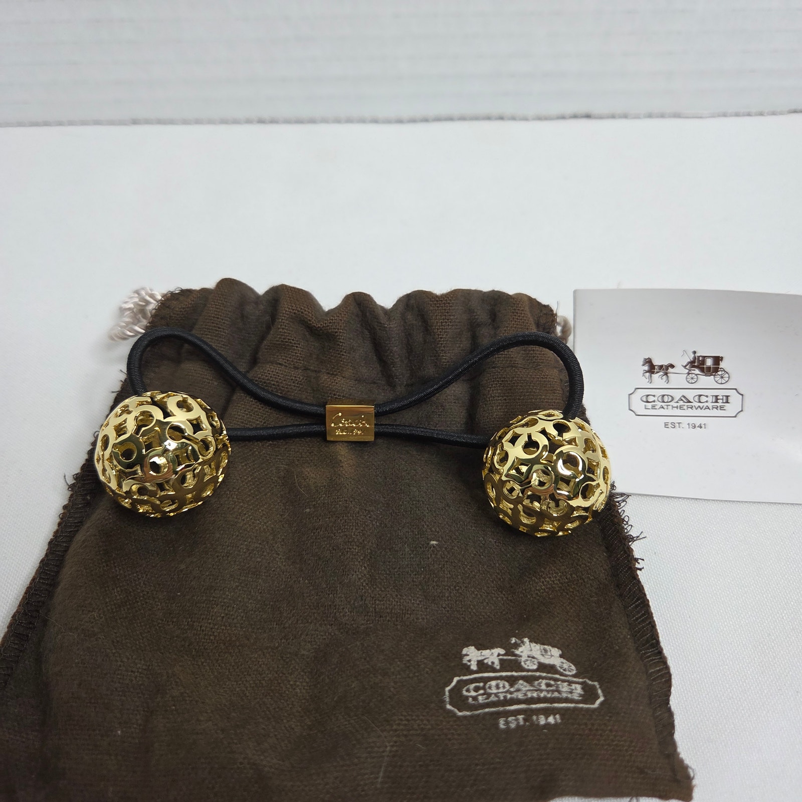 Coach Signature C Ponytail Hair Tie With 2 Gold Tone Balls and Dust Cover