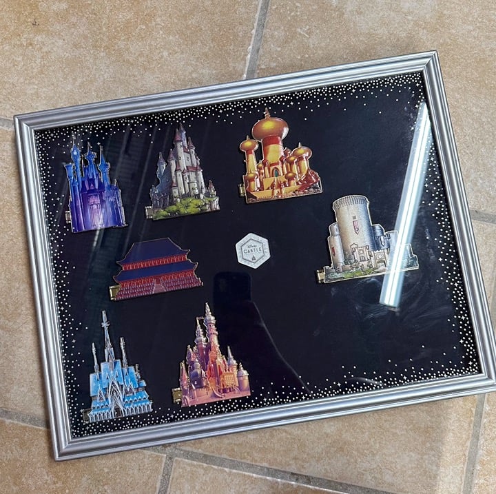NEW Disney Castle Pin Collection 7 of 12 Pins included plus Collectors Case