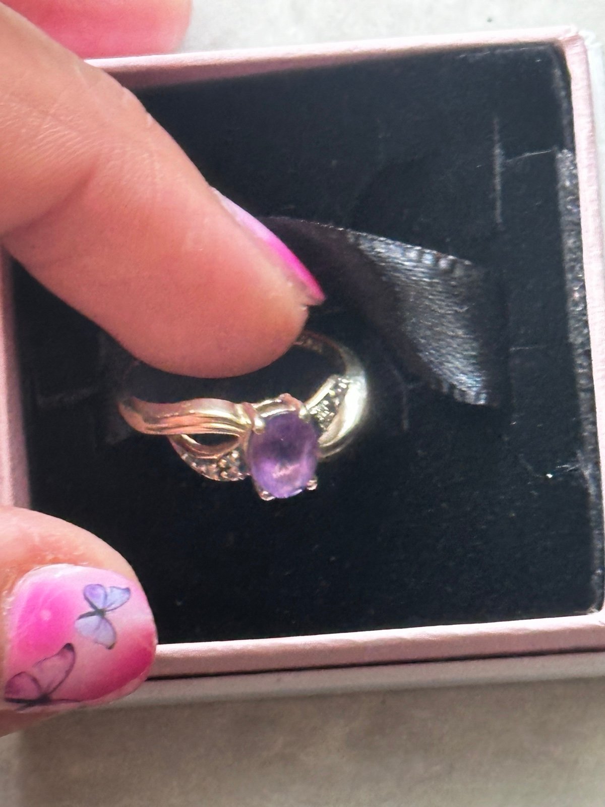 10K Amethyst stone with small diamonds