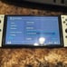 Nintendo Switch OLED White + Mario Kart 8 & Pro Controller