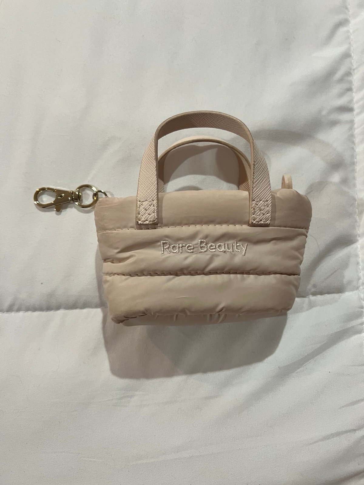 Rare Beauty mini puffer keychain