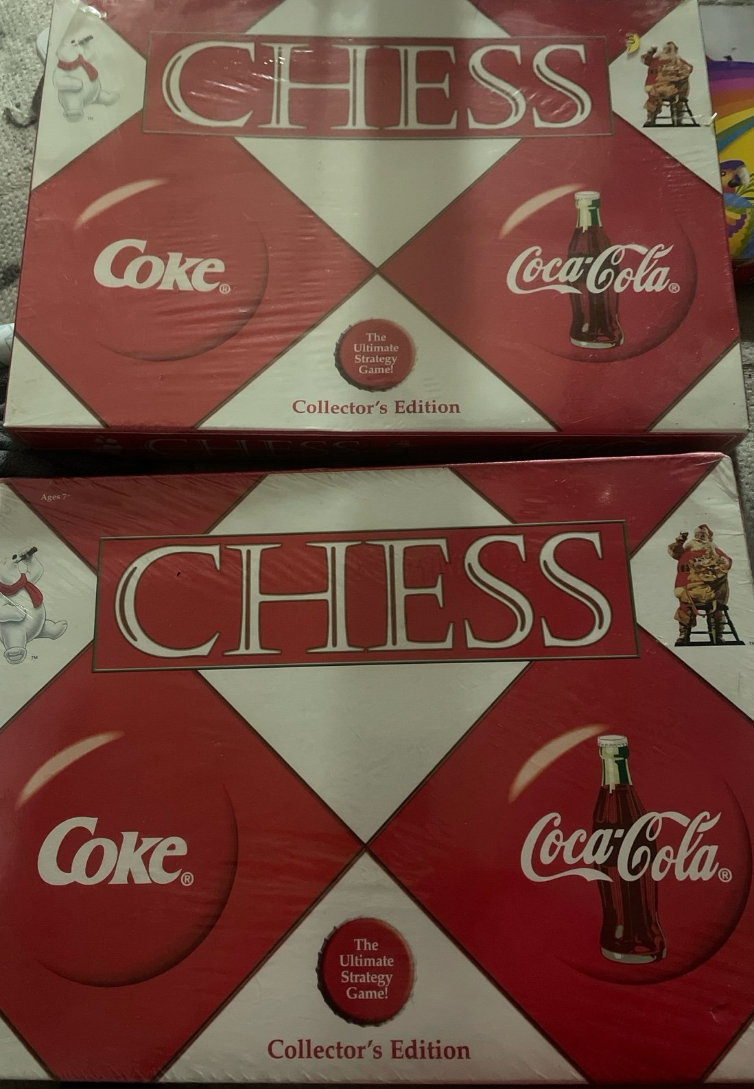 Two 2002 Coca Cola collectors edition chess games.