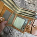 Vintage Japanese leather wallet with an embossed map of Japan on one side Dragon