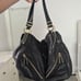 Spacious black and gold Michael Kors Shoulder Purse