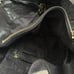 Spacious black and gold Michael Kors Shoulder Purse