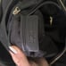 Spacious black and gold Michael Kors Shoulder Purse