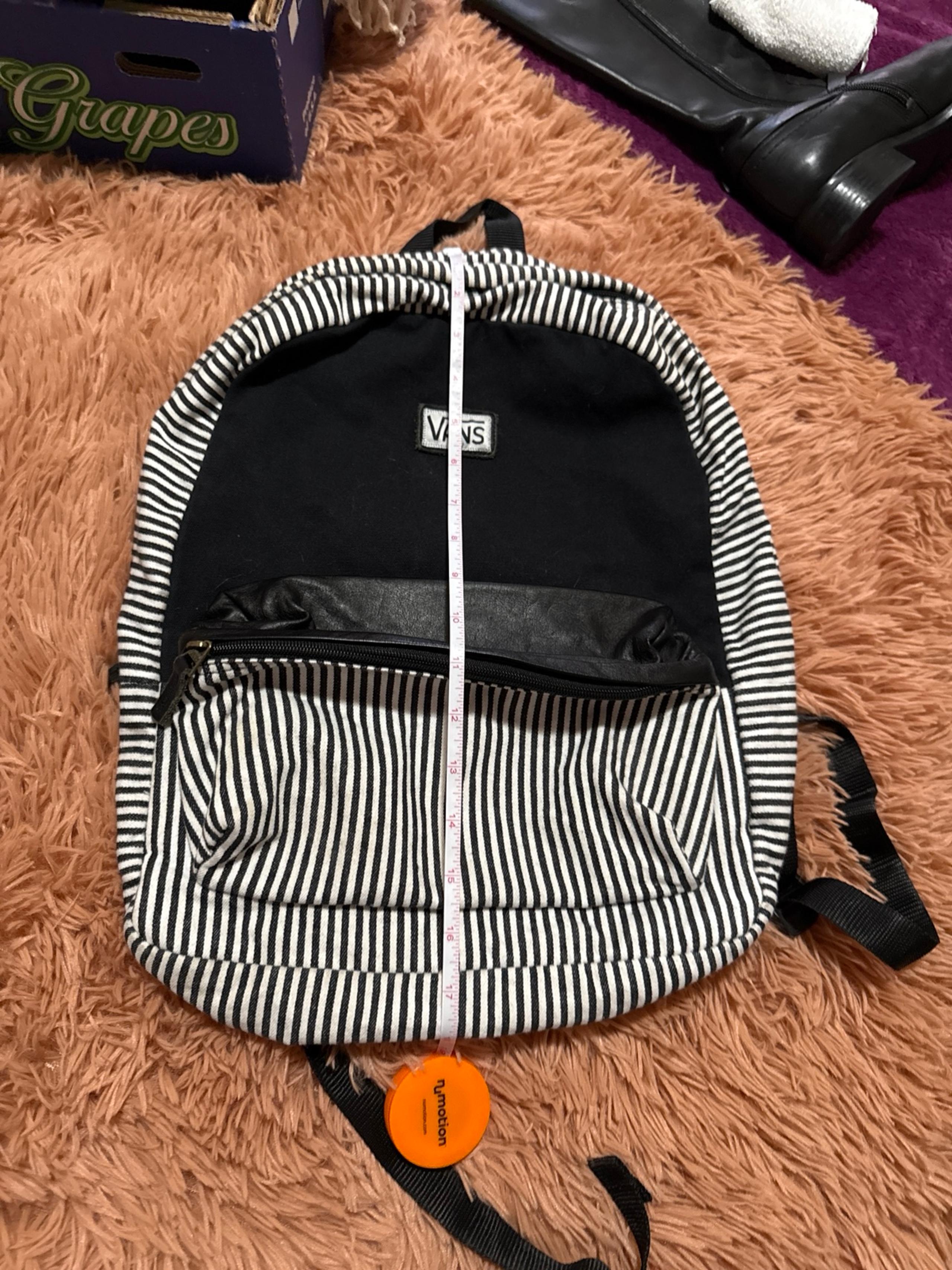 VANS, backpack, black, and striped material zipper pocket in the front
