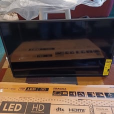 A NEW 32-inch colored Insignia TV