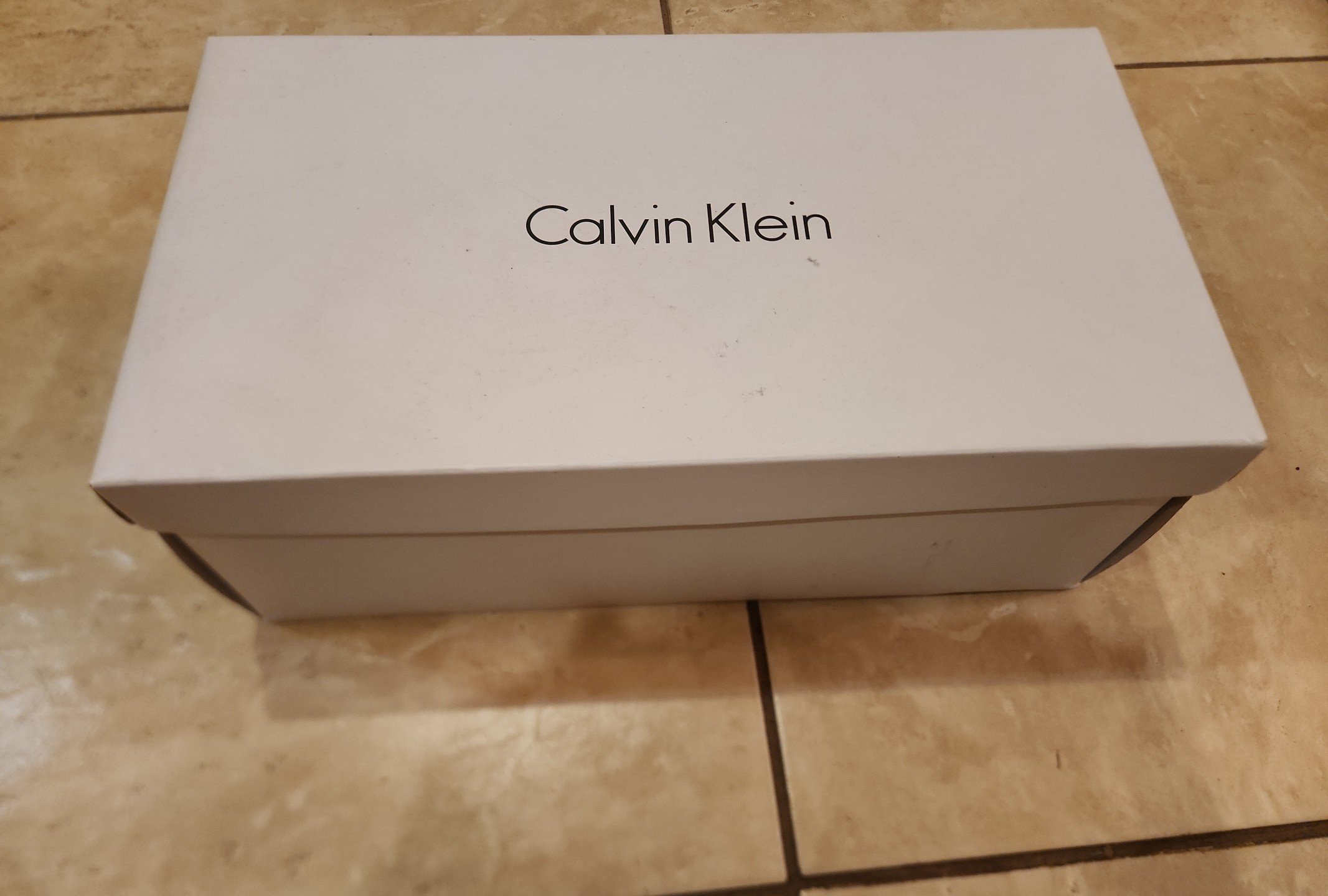 Calvin Klein white leather loafers