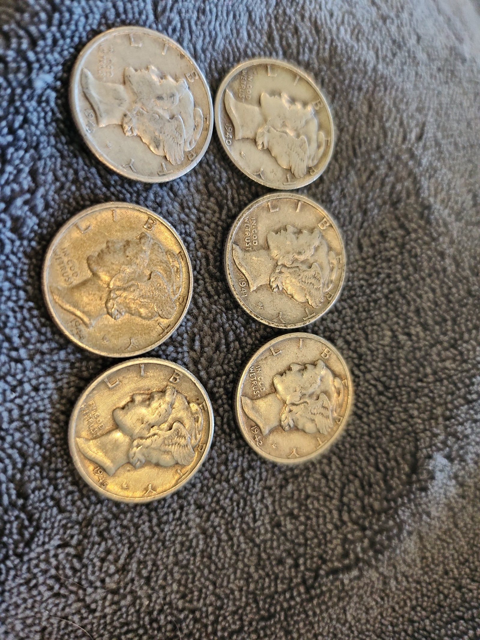 1940-1941D, 1942P, 1943S and 1944-1945P silver Mercury Dimes. F-XF Condition.