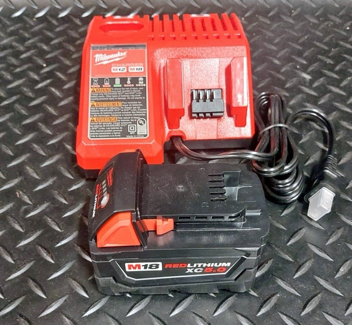 NEW GENUINE Milwaukee M18 5.0ah Battery with M18/M12 Charger