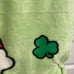 FIRM Hello Kitty St. Patrick’s Day plush throw (rainbow/shamrock)
