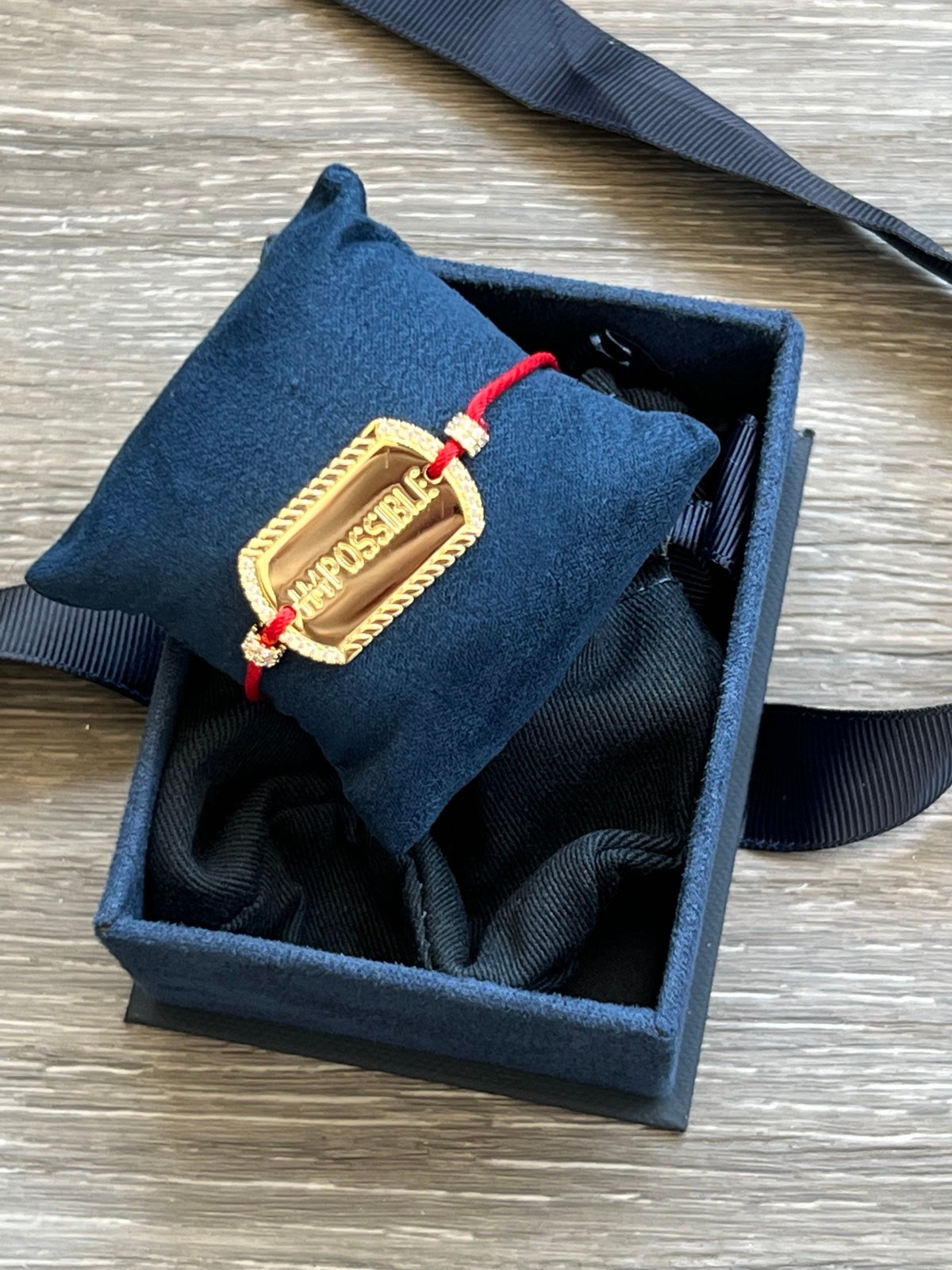 Bracelet nylon red with gold