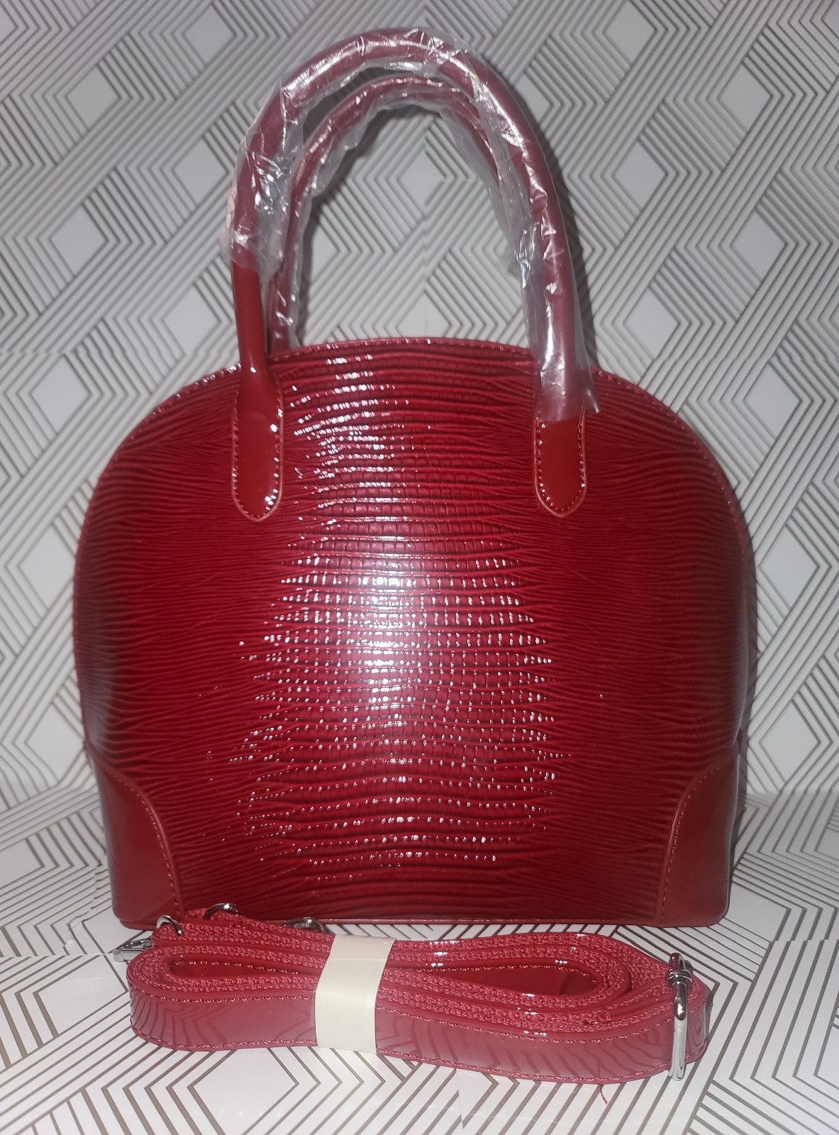 Red handbag with straps